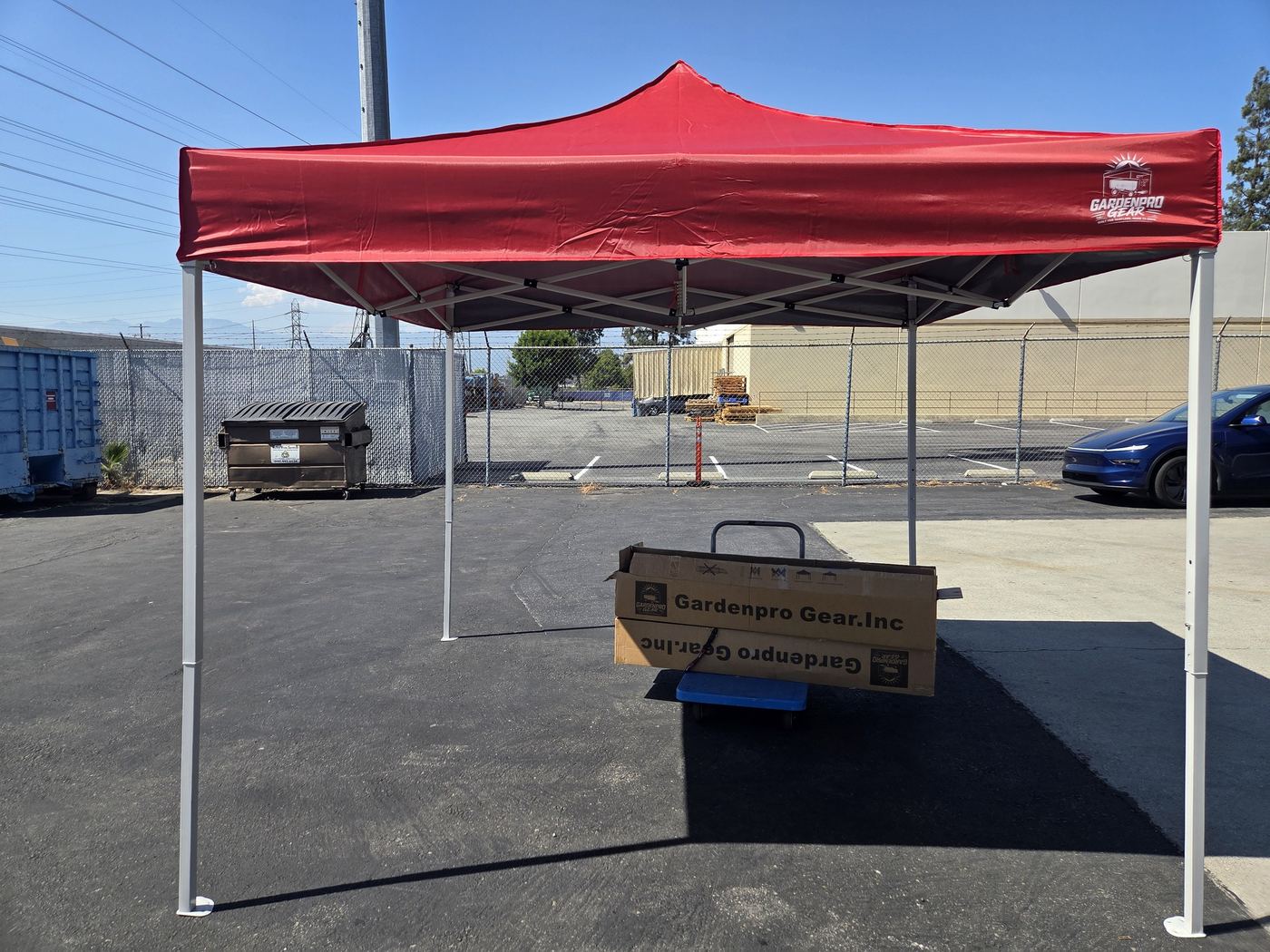 Red GardenPro Gear vendor canopy outdoors